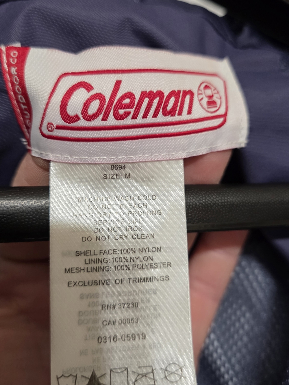 Coleman Navy Jacket with Red Logo